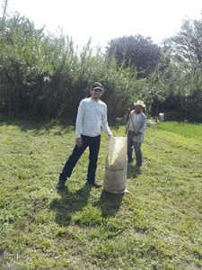 Iván Sandoval-Cervantes doing fieldwork in Oaxaca. Standing next to him is his host in the community.