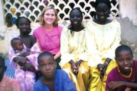 Courtney Smith (back row, center) in the small town where she conducted much of her research while supported by CSWS funding.