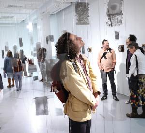 Opening reception for the Ghost Forest photography exhibit, which included Bellona's sound installation Wildfire—a 48-foot-long speaker array that plays back a wave of fire sounds at speeds of actual wildfires / photo by Jack Liu.