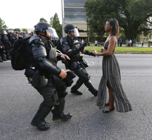 Activist Leshia Evans stands her ground while offering her hands for arrest as she is charged by riot police during a protest against police brutality outside the Baton Rouge Police Department in Louisiana, USA, 9 July 2016. Evans, a 28-yearold Pennsylvania nurse and mother of one, traveled to Baton Rouge to protest the shooting of Alton Sterling. Sterling was a 37-year-old black man and father of five, who was shot at close range by two white police officers. REUTERS/Jonathan Bachman TPX IMAGES OF THE DAY
