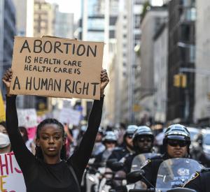 Demonstrators Attend Women's March to Defend Reproductive Rights A demonstrator holds a pro-choice sign during a Women's March in New York on Saturday, Oct. 2, 2021. Women's March and more than 90 other groups organized a national rally to protect women's reproductive rights ahead of the Supreme Court reconvening on October 4 / photo by Stephanie Keith, Bloomberg via Getty Images.