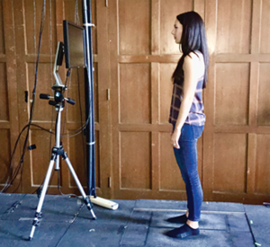 This is an image of the moving platforms (measure balance response to unexpected perturbation) and the computer monitor (administers mentally fatiguing task) Morris uses during her study.