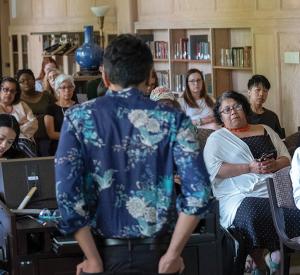 Chandan Reddy deliverered the Queer Studies Lecture at the Knight Library Browsing Room to a mixed audience of faculty, staff, and students. Right: Chandan Reddy listens to a question from the audience / photos by Amiran White.