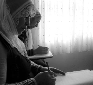 Two women in a literacy class.