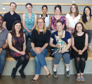 TAG (Transitions in Adolescent Girls) research team members include, top l-r: Ben Nelson, Dr. Jenn Pfeifer, Dr. Nandi Vijayakumar, Lauren Hval, Bernie Brady, Theresa Cheng, and bottom l-r: Dr. Nick Allen, Sam Chavez, Dr. Michelle Byrne, Sarah Donaldson, Izzy the dog, and Dr. Kate Mills / photo by Dr. Jim Prell.
