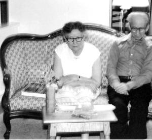 Madge and Val Lorwin watch a tea ceremony being performed in their living room, circa 1981 (photo courtesy of George Sheridan)