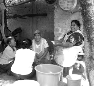 Women in San Agustin Atenango, Oaxaca working together to prepare a communal meal for a political rally
