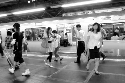 Evening on a train platform in Shinjuku Station, the world’s busiest terminal, used by an average of 3.64 million people a day.