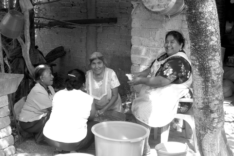 Women in San Agustin Atenango, Oaxaca working together to prepare a communal meal for a political rally