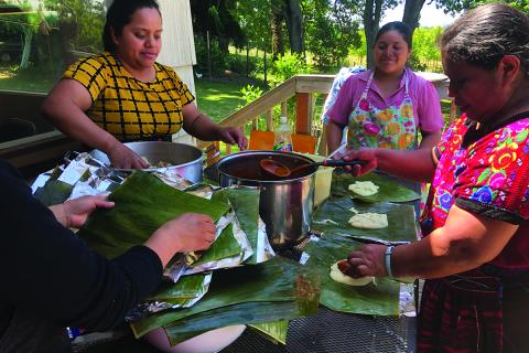 Guatemalan Maya women prepare a meal of traditional foods / photo provided by Liesl Cohn De León.
