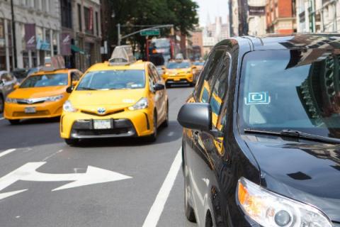 On the Frontlines of the Gig Economy: Organizing Taxi Workers under Ubernomics