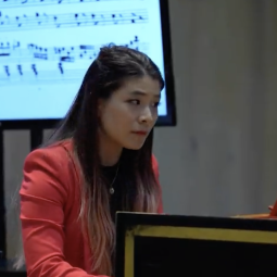 Chen plays a harpsichord.