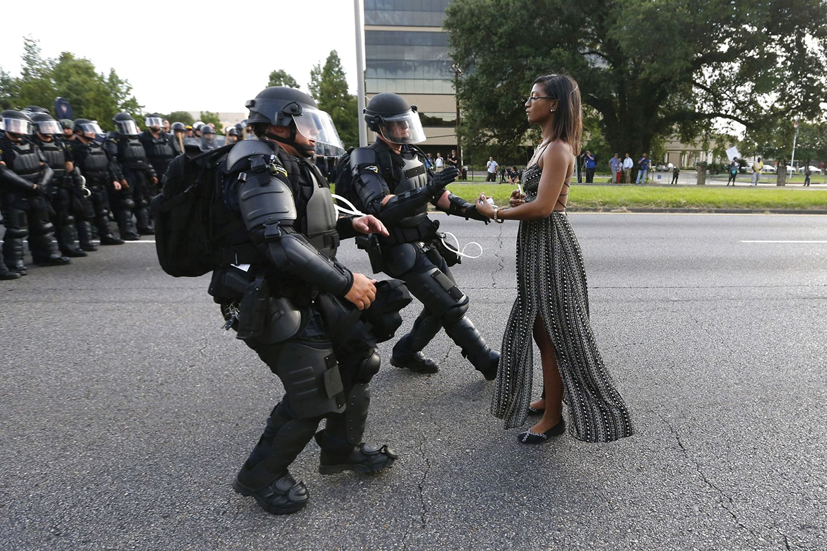 Activist Leshia Evans stands her ground while offering her hands for arrest as she is charged by riot police during a protest against police brutality outside the Baton Rouge Police Department in Louisiana, USA, 9 July 2016. Evans, a 28-yearold Pennsylvania nurse and mother of one, traveled to Baton Rouge to protest the shooting of Alton Sterling. Sterling was a 37-year-old black man and father of five, who was shot at close range by two white police officers. REUTERS/Jonathan Bachman TPX IMAGES OF THE DAY