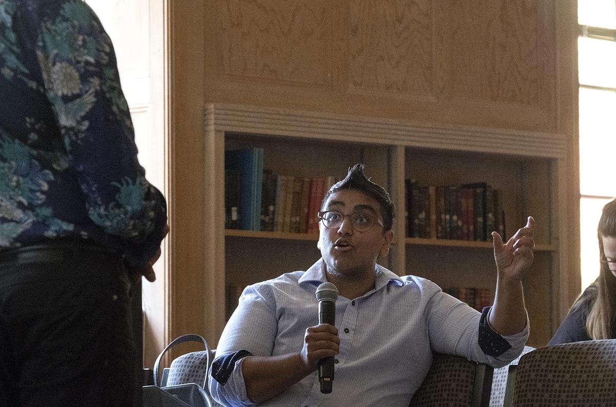 V Chaudhry poses a question to speaker Chandan Reddy / photo by Amiran White, May 2019