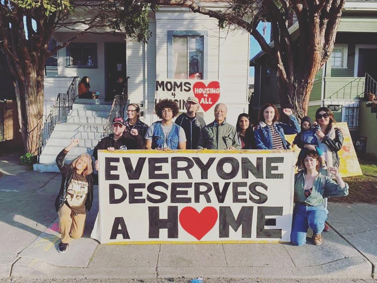 Oakland: Moms4Housing activists in front of the house they took over and eventually purchased / photo provided by. Claire Herbert.