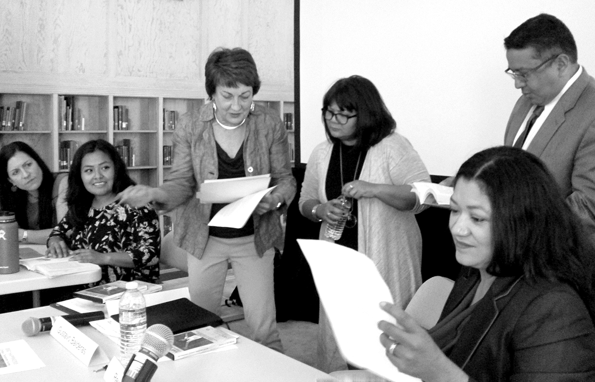 At a panel focused on Reyna Grande’s memoir, panelists included, from left: Kristin Yarris, Lidiana Soto, Lynn Stephen, Carmen Urbina, 4J superintendent Gustavo Balderas, and author Reyna Grande / photo by Alice Evans.