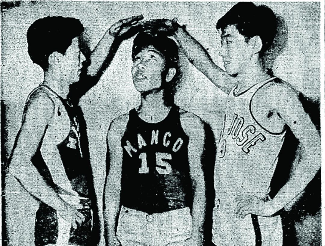 A newspaper clipping of players in the Oriental-American National Basketball Tournament in Seattle.