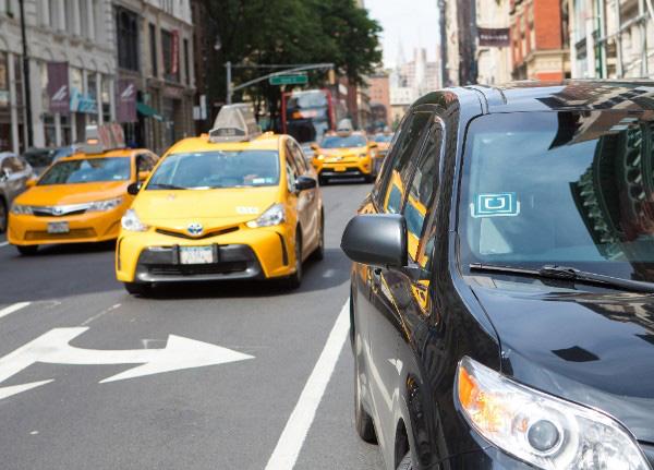 On the Frontlines of the Gig Economy: Organizing Taxi Workers under Ubernomics