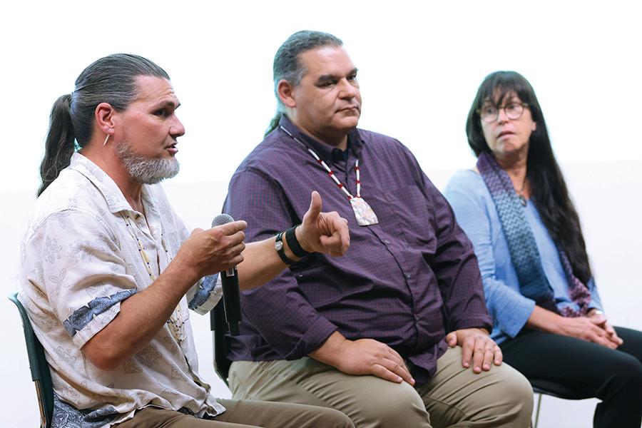 Pictured from left are Joe Scott, David G. Lewis, and Kari Marie Norgaard.