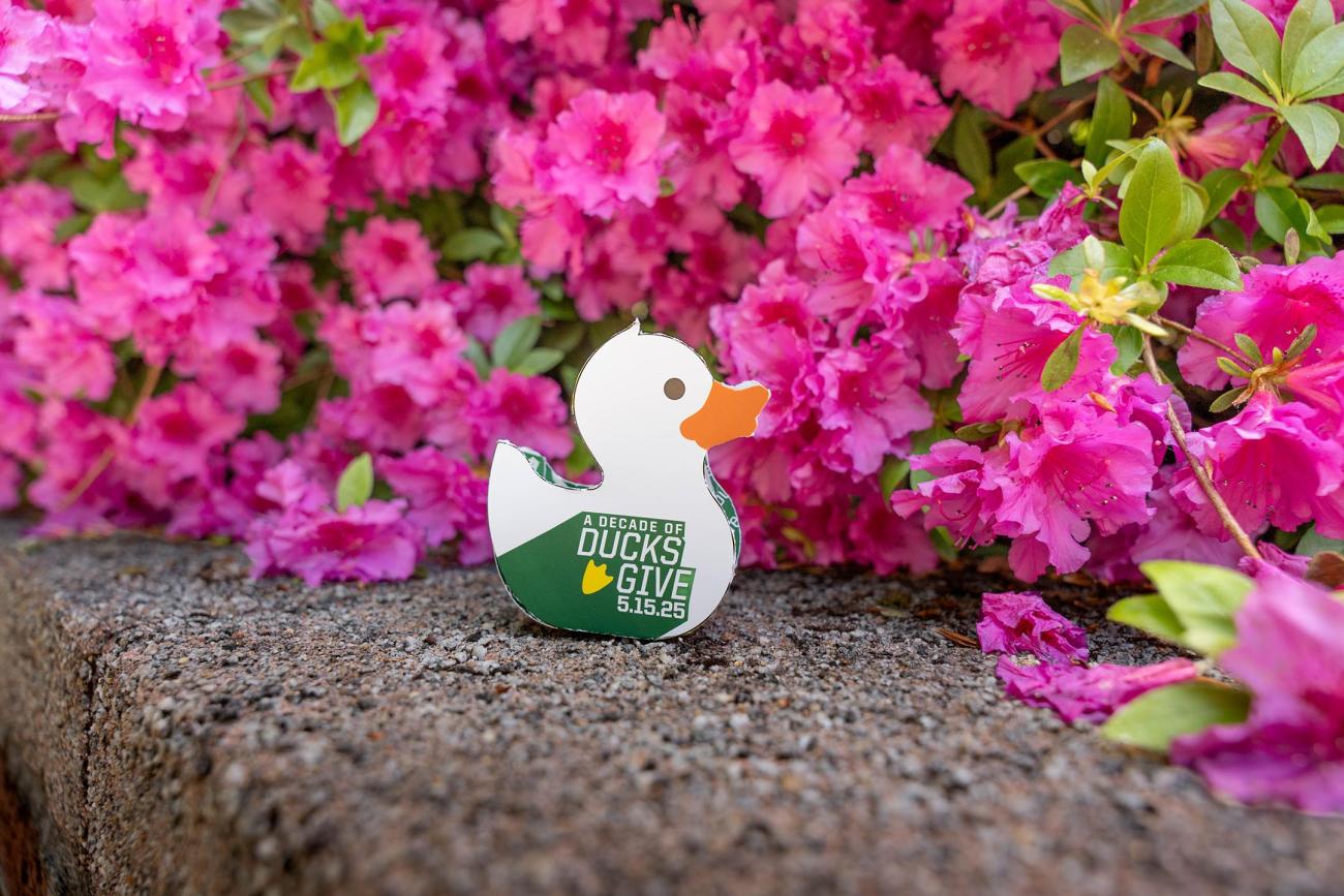 Pictured are flowers and a paper duck.