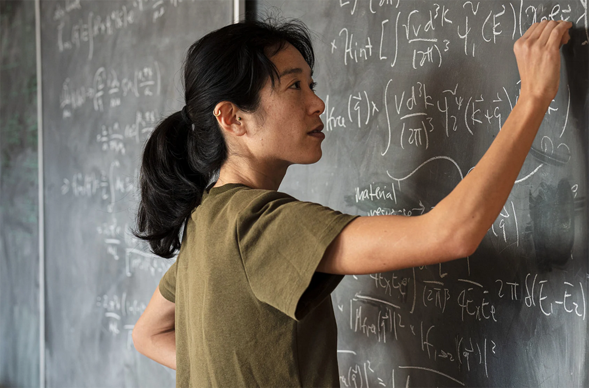 Tien-Tien Yu spends a lot of time at the blackboard.