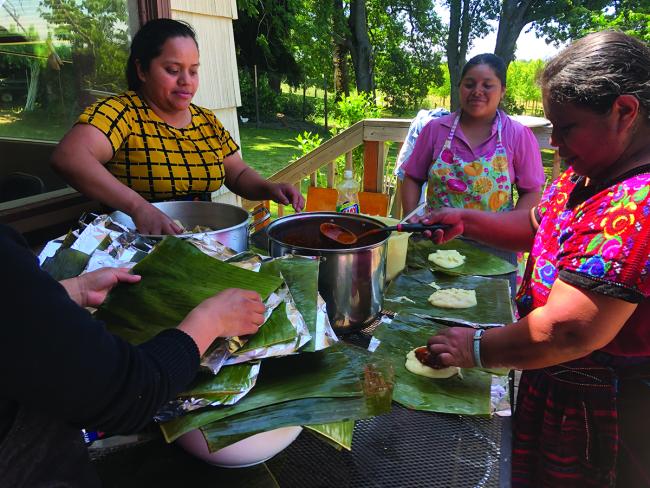 Guatemalan Maya women prepare a meal of traditional foods / photo provided by Liesl Cohn De León.