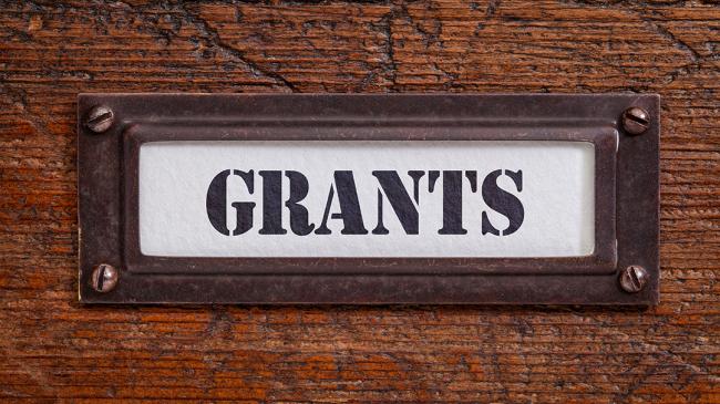 A drawer labeled "grants."