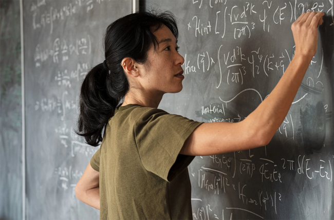 Tien-Tien Yu spends a lot of time at the blackboard.